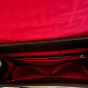 Beautiful fun larger crossbody. Very sturdy, multi-pocket, roomy and stylish